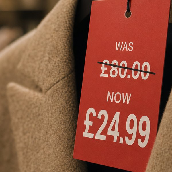 Fake sale sign with crossed out price — detail