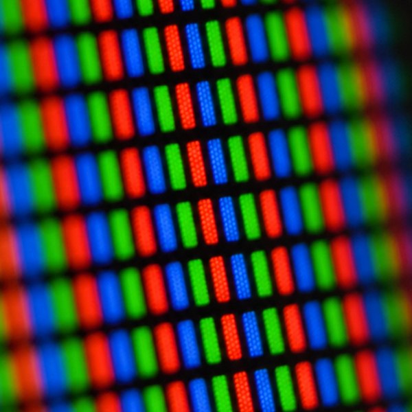 Screen displaying RGB color pixels closeup — detail
